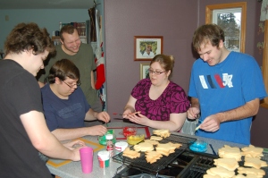 Look at them enjoying their Christmas cookie tradition